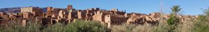 Moroccan buildings clustered in the desert.