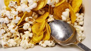 Closeup of popcorn and chips.