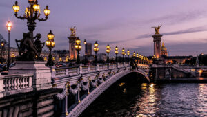 The Pont Alexandre III bridge, with its Art Nouveau lamps lit up at night