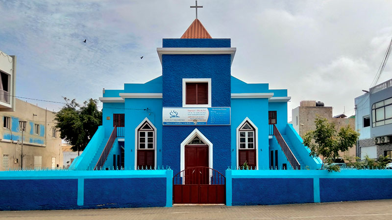 The Nazerite Church, painted a dark and light shade of very bright blue.