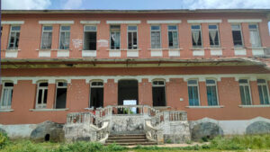 The abandoned hospital's facade.