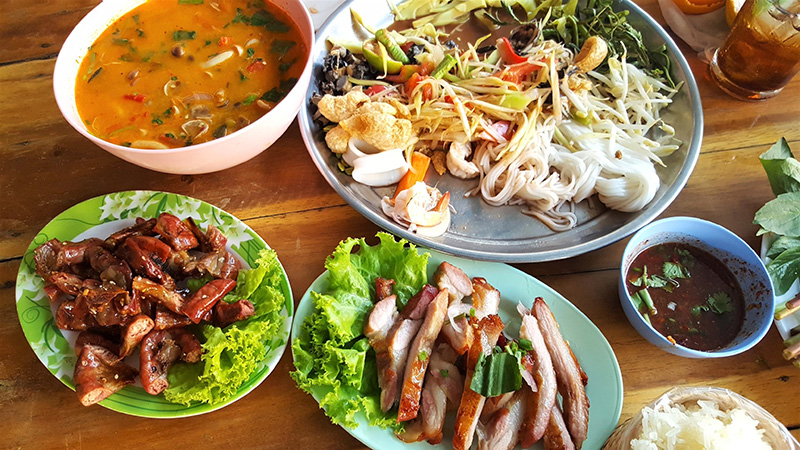 Several Thai food dishes.